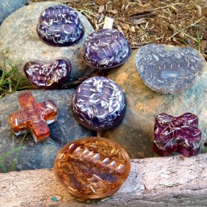 Towerbusters, Orgone Hearts and Towerbusters. 24 k glitter, gold foil, Tesla Coils and aluminum shavings/filings. 